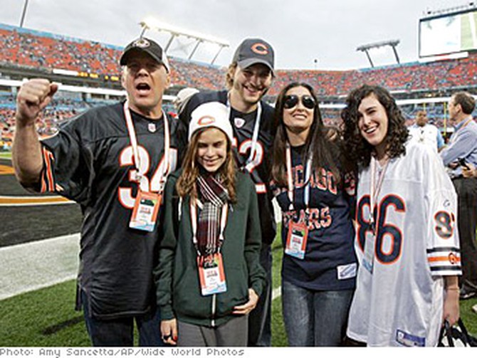 Demi Moore at Super Bowl XLI with her ex-husband Bruce Willis, husband Ashton Kutcher and daughters Tallulah and Rumer.