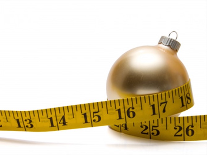 Holiday ornament and measuring tape