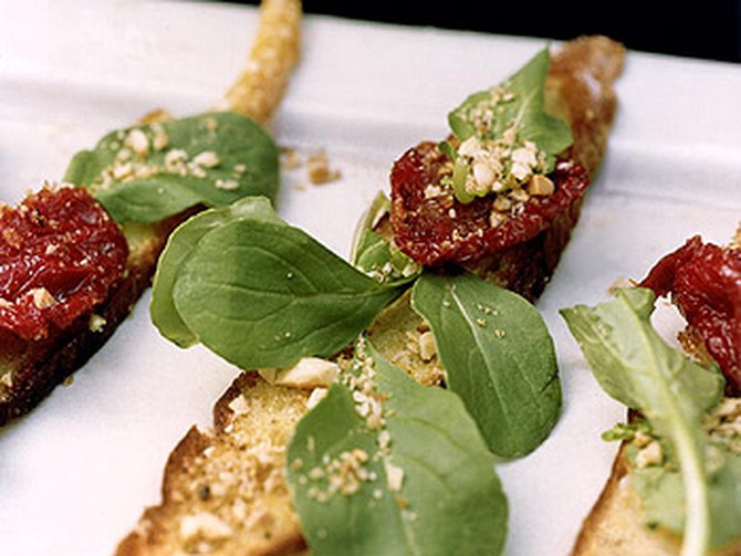 Oven-Dried-Tomato Bruschetta with Almonds and Arugula