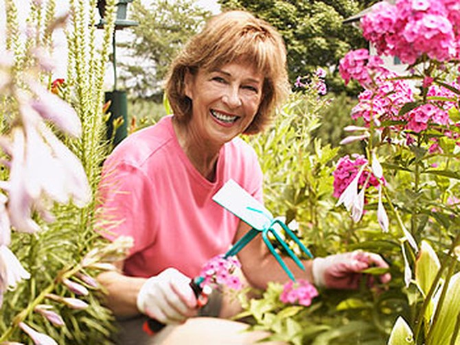 Woman gardening by hand
