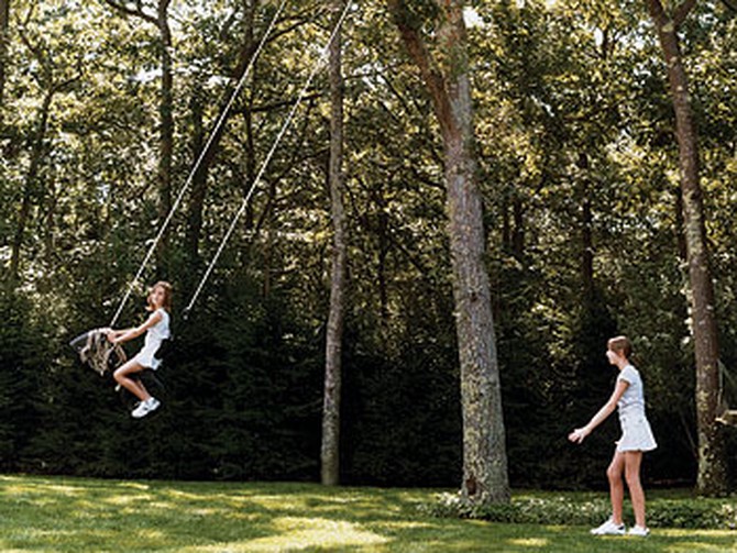 Swinging in the backyard