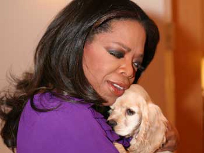 Oprah hugs Sadie.