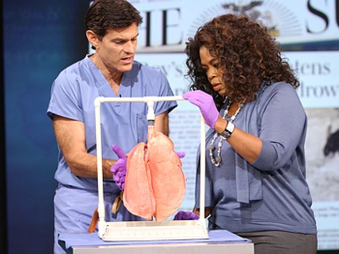Dr. Oz demonstrates how human lungs operate using a pig's lungs.