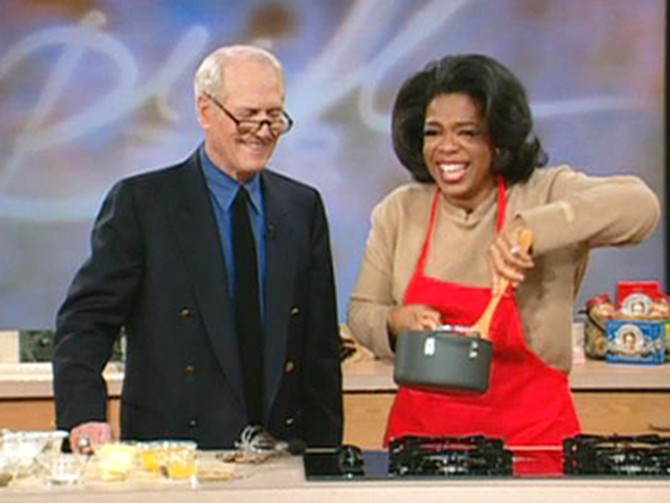 Oprah cooks with Paul Newman in 1998.