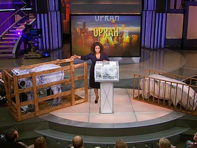 Oprah shows standard animal cages.