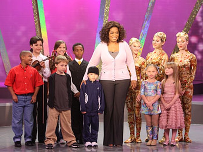 Oprah meets talented children.