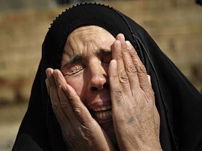 An Iraqi woman wails.