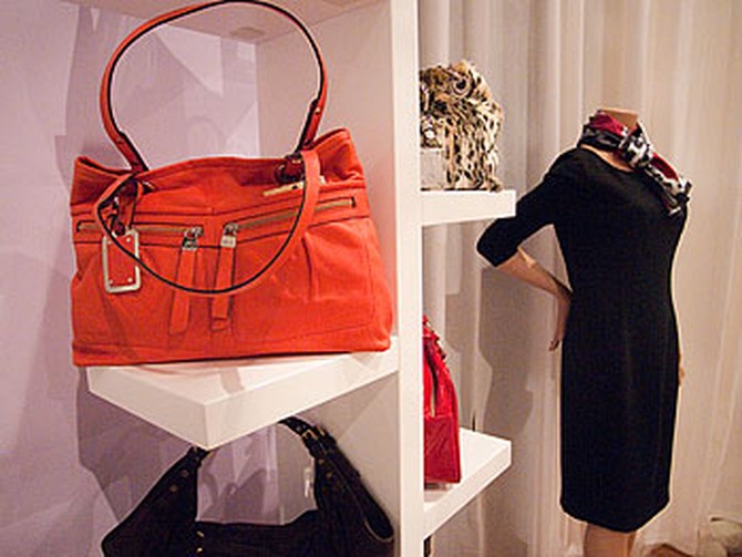 Orange handbag at Oprah's Accessory Boutique