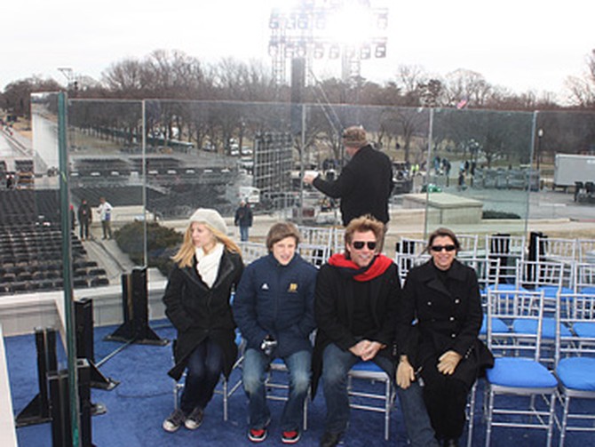 Jon Bon Jovi and his family sit in the executive seats.