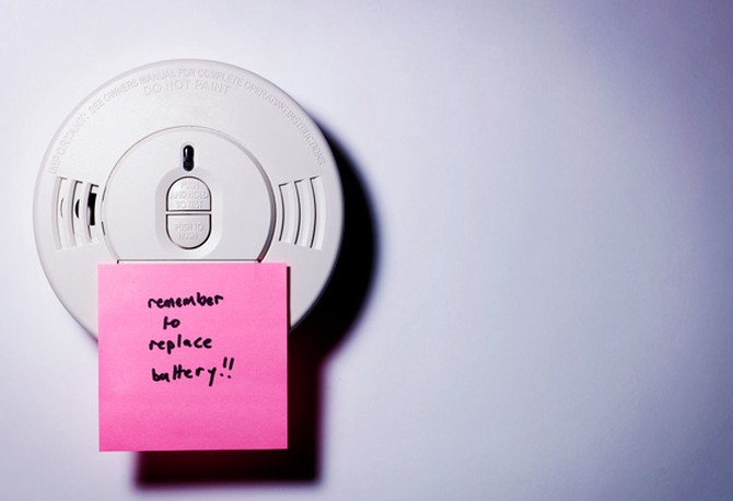 Smoke detector with sticky note