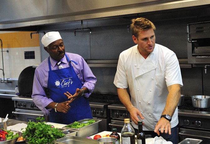 Curtis Stone helps Tony in the kitchen