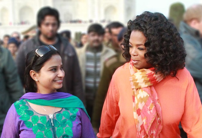 Oprah Winfrey and her guide at the Taj Mahal