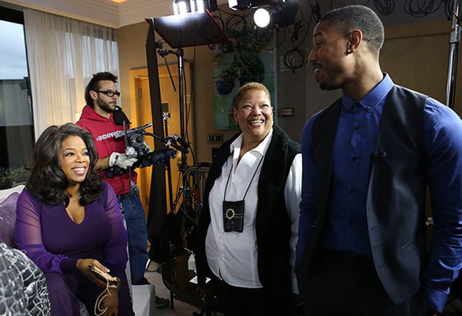 Oprah Winfrey chatting with "Fruitvale Station" star Michael B. Jordan and his aunt, Jeanette Marable