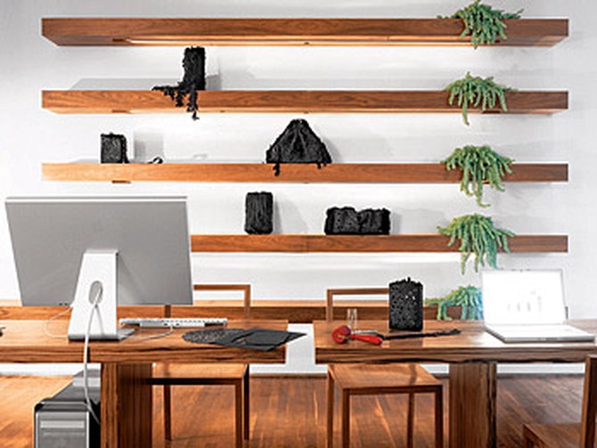 Tina and James designed the American walnut shelves in the home office.