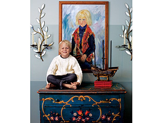 Kirsten's son and a portrait of his father.