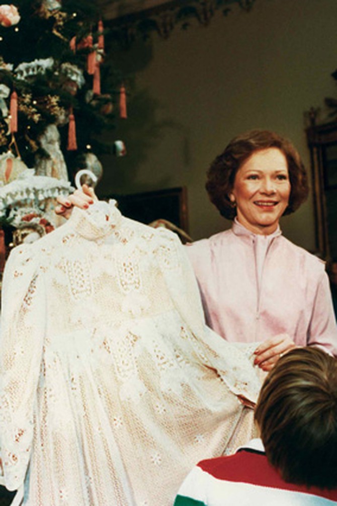 First Lady Rosalynn Carter displays a ball gown made for daughter Amy.