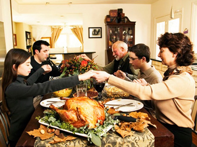 Family at Thanksgiving table