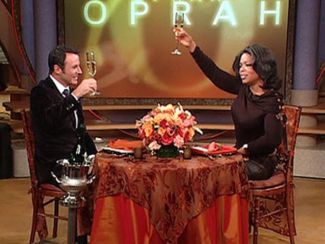 Oprah and Colin Cowie toast the newlyweds