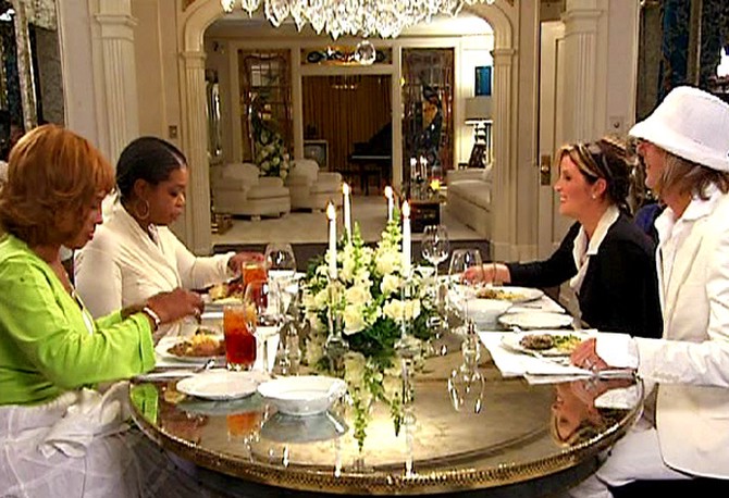 Lisa Marie and her husband, Michael, dine with Oprah and Gayle.
