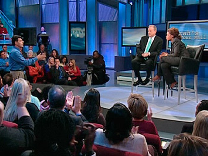 Bill O'Reilly and Oprah talk with the audience.