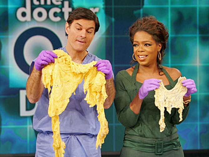 Dr. Oz and Oprah hold omentums
