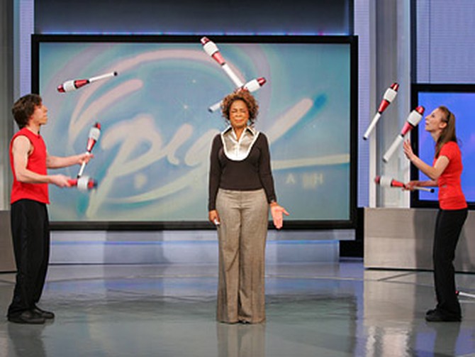 Oprah gets in on Olga and Vova Galchenko's juggling act.