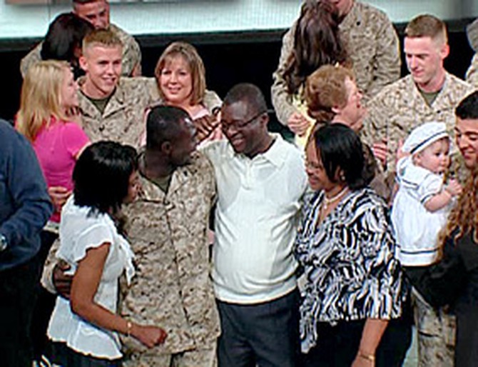 The Marines of Alpha Company reunite with their families.