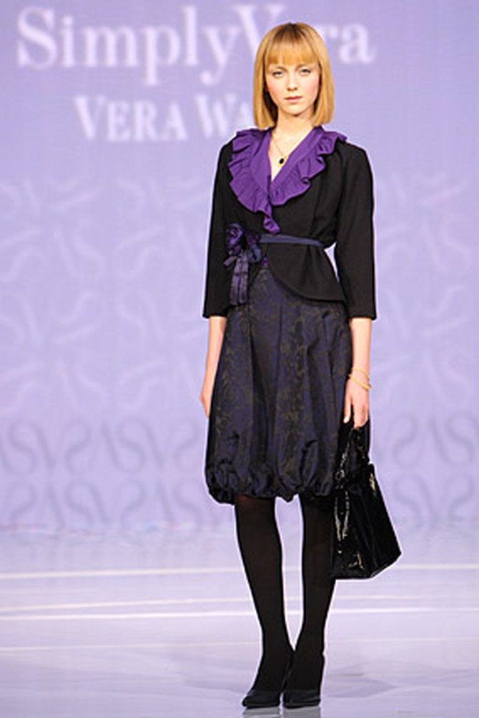 Vera Wang's belted jacket, purple blouse and brocade skirt