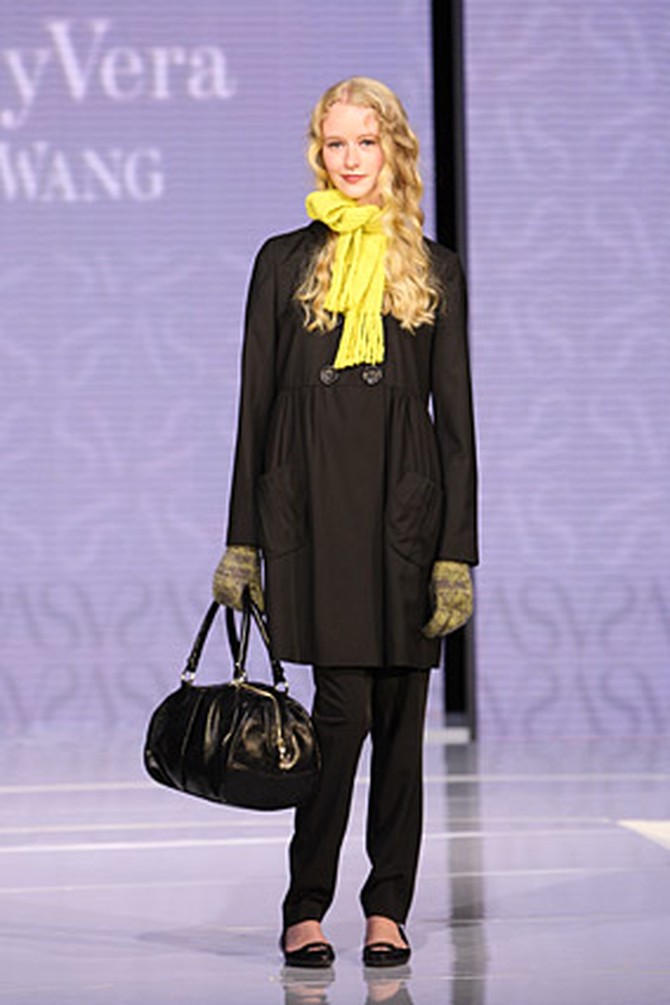 Simply Vera's black pea coat and yellow scarf