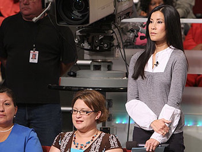 'Oprah Show' correspondent Lisa Ling prepares to interview audience members.