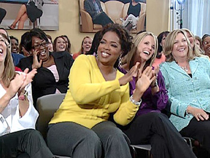 Oprah with the men's wives