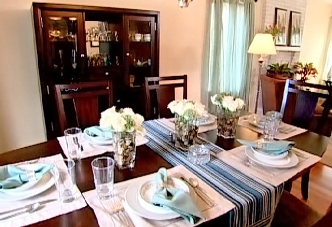 The dining room table features Sharyn's own dishes.