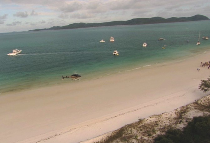 Oprah arrives at a beach barbecue at Whitehaven Beach