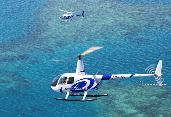 Helicopters fly over the Great Barrier Reef
