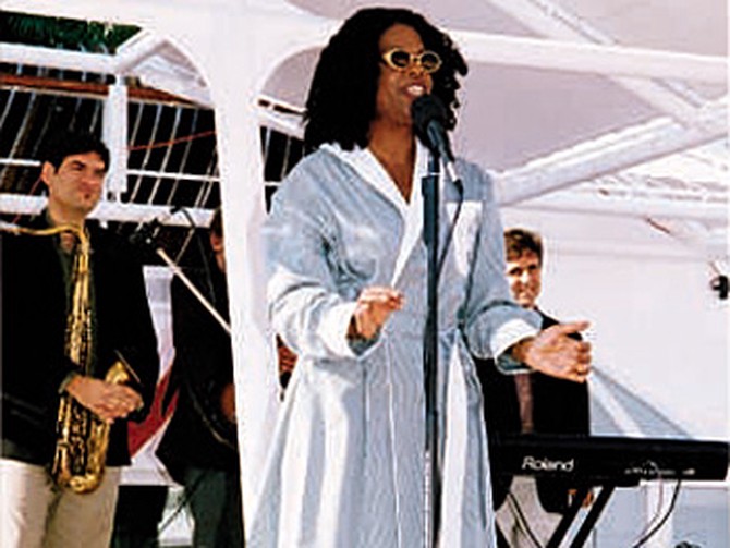 Oprah (wearing one of the bathrobes she gave everyone)