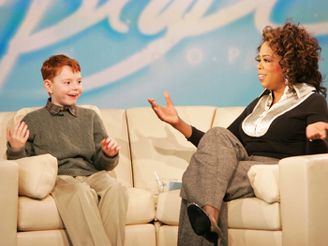 Daniel Cook and Oprah reflect on a job well done.