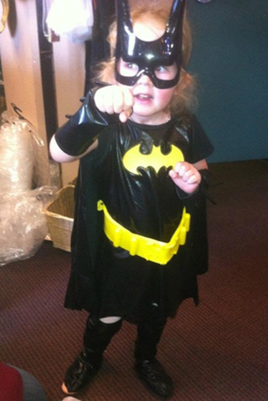 Girl dressed as Batman