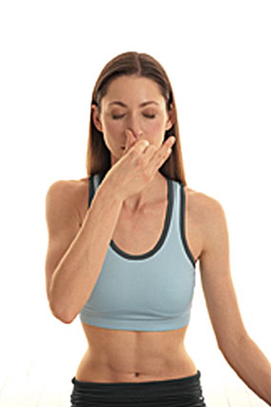 Alternate nostril breathing yoga move