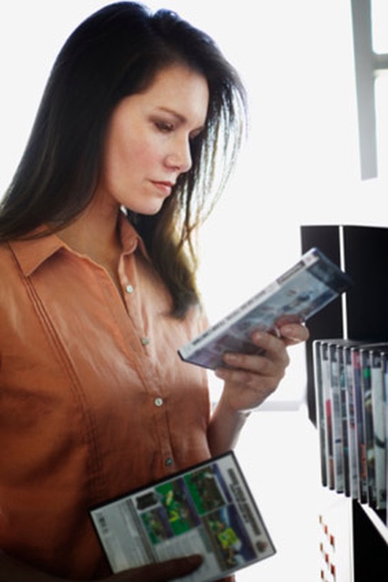 Woman looking at DVDs