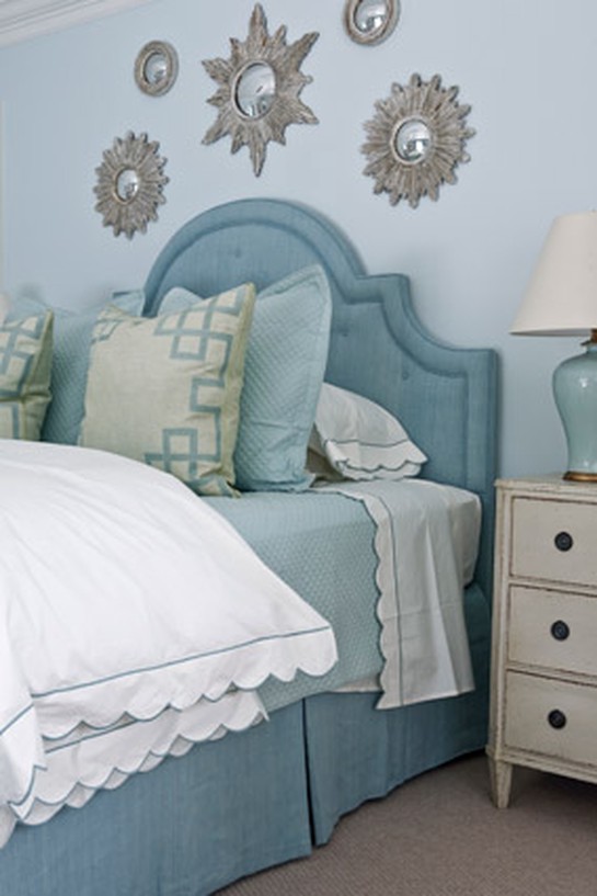 Powder blue bedroom with white bedding