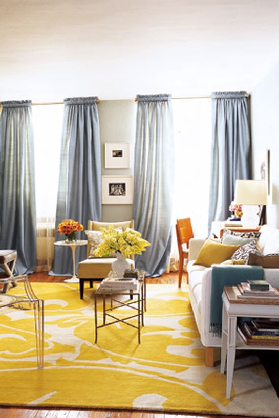 Room with yellow rug by Lance Boyd