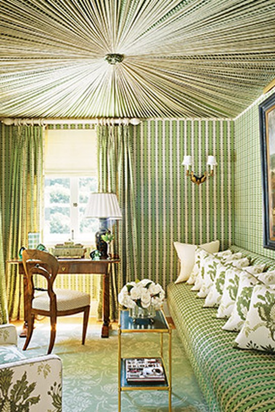 Green patterned walls and tented ceiling of a study in Oprah's guest house