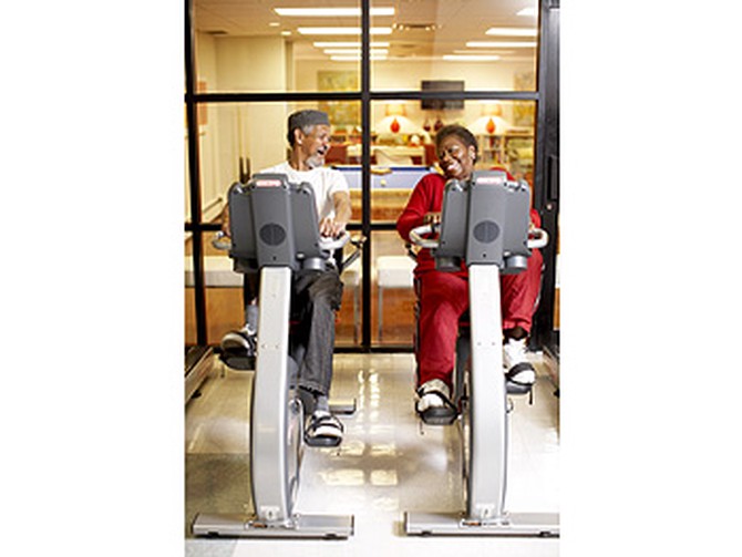 Residents take the new Gym Source bikes for a spin.