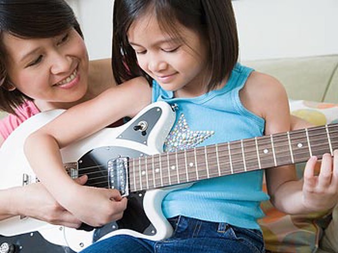 Take music lessons with your children.