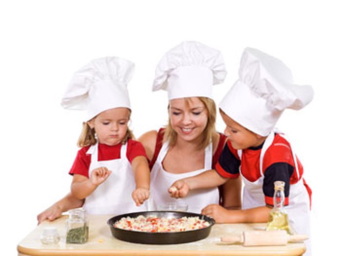 Family making pizza