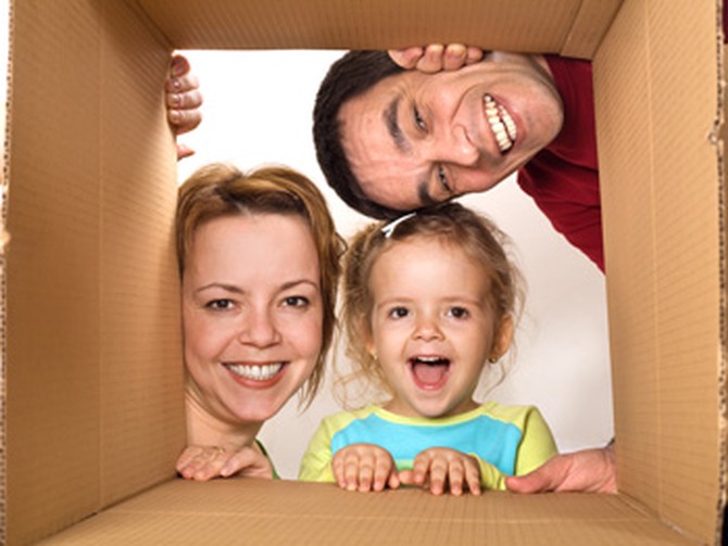 Family looking into box
