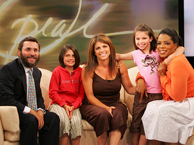 Rabbi Shmuley and Oprah pose with Carolyn, Mackensey and Meagan.