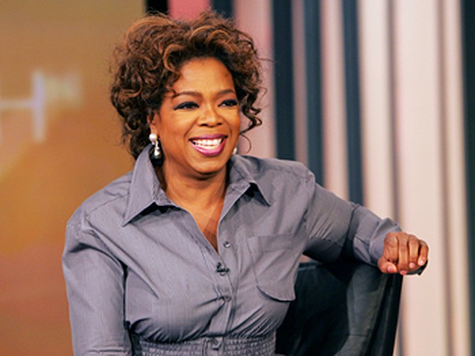Oprah talks to the audience before a show taping.