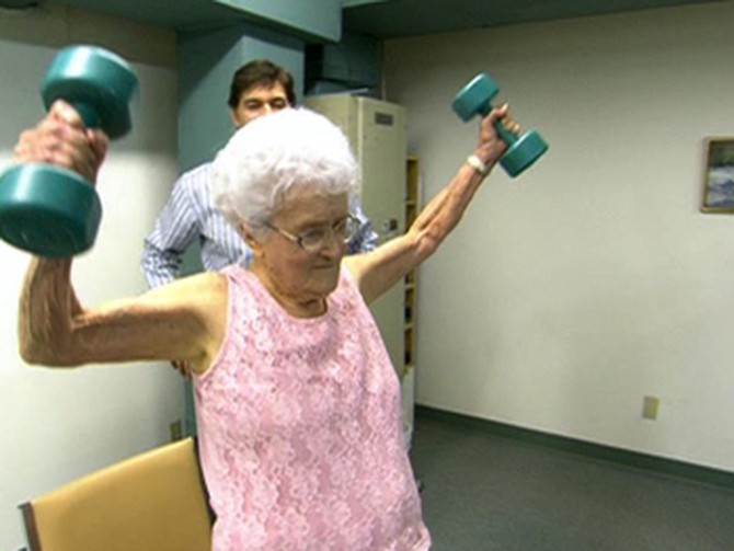 At 103, Marge Jetton shows Dr. Oz and Dan Buettner her exercise routine.