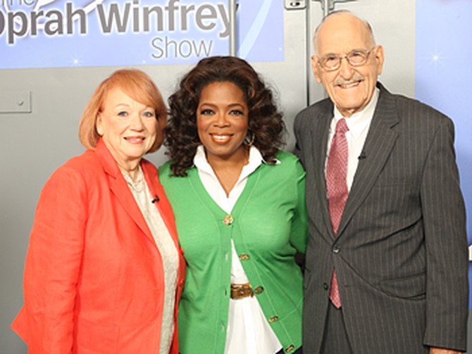 Oprah poses with Dr. Ellsworth Wareham and his wife, Barbara.